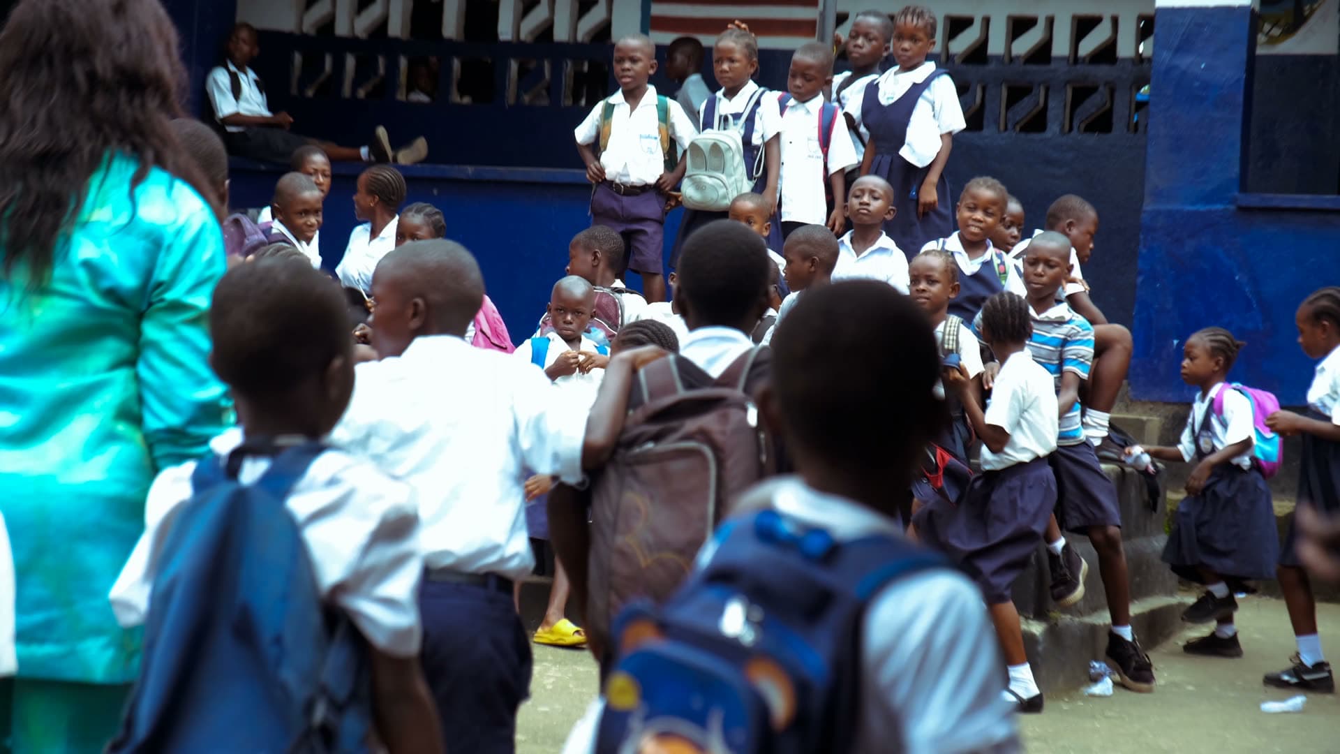 Students gathering outside school in Kenya